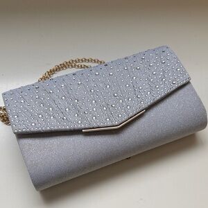Elegant Gray Clutch with Gold Chain
